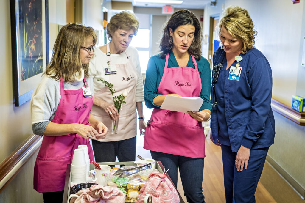 Kitchen Kapers High Tea Experience four volunteers